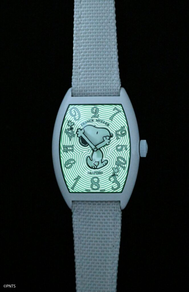 Night-time view of Franck Muller x Bamford Watch Department Crazy Hours Arctic Snoopy wristwatch