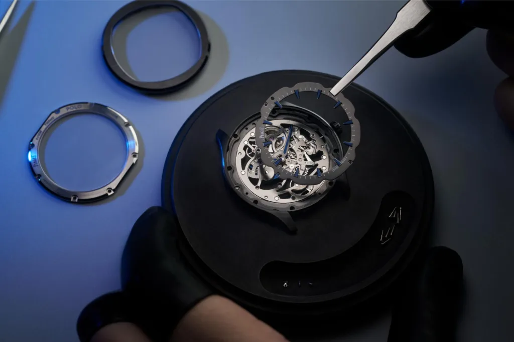 Piaget Polo Ceramic G0A49011 watch being put together by a master watchmaker