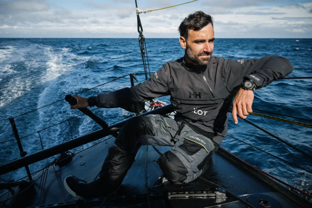 Hublot Big Bang Unico Sailing Team watch worn on the wrist on sailing yacht modelled by Alan Roura