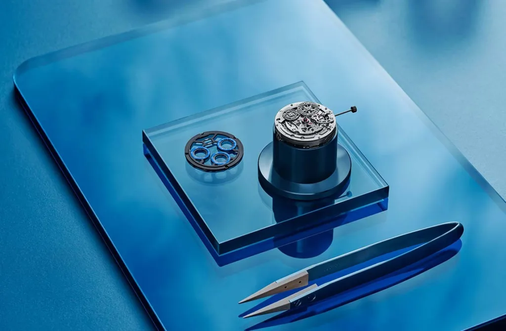 Audemars Piguet Royal Oak Concept Split Seconds Chronograph GMT Large Date Chroma Forged Technology watch movement on desk in blue setting