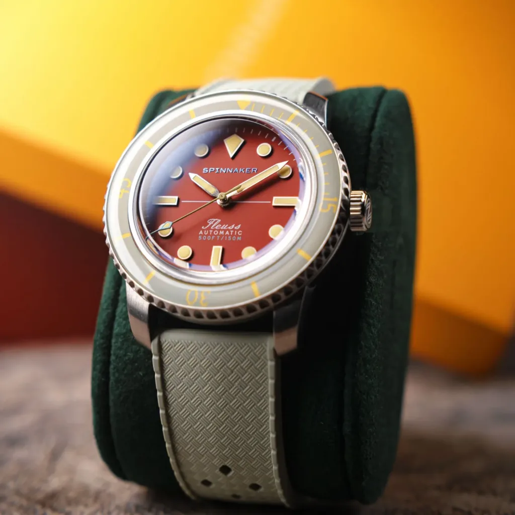 Spinnaker Introduces Fleuss 40 Automatic - 145th with coral red dial on rubber strap